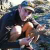 Portrait of bioGraphic co-founder and editor-in-chief Steven Bedard holding a sea star