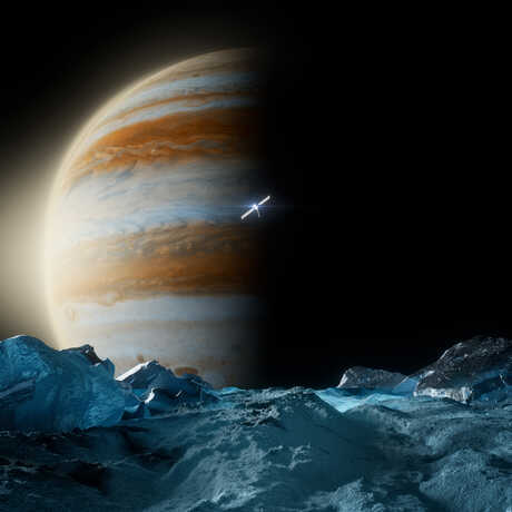 Artist rendering of surface of Jupiter's moon, Europa, with Jupiter looming in the background, and Europa Clipper spacecraft in the middle