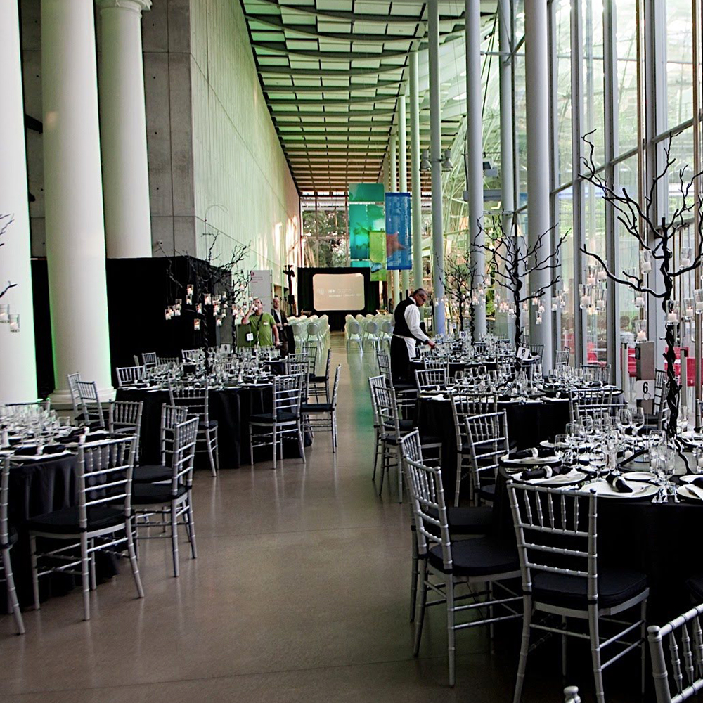 presentation and tables set up for an event